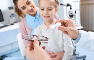 Young girl, eye consultation.