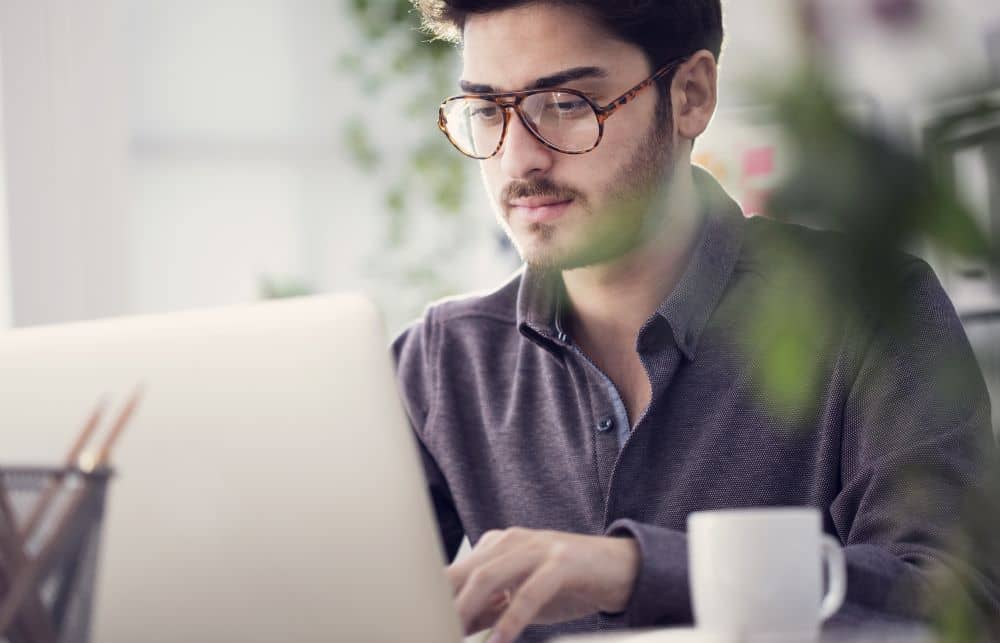 Working man wearing eyeglasses.