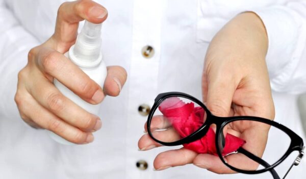 Special liquid cleaner specifically made for eyeglasses will help you get the oil smudges off the lens.