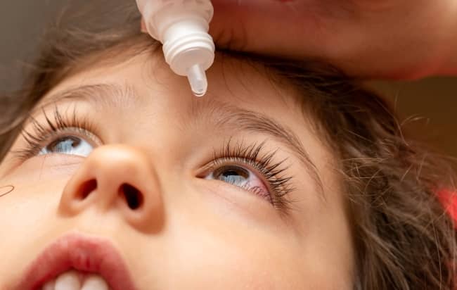 Atropine eye drops are typically used to dilate the eyes during a comprehensive eye exam.
