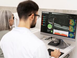 optometrist doing eye disease checks